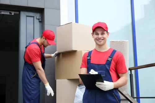 Removal van and moving team prepared for a local house move in Watford
