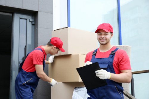 Removal team sorting recyclable materials for a Watford move