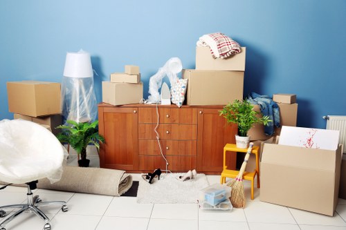 Man and van loading household items for a move in Watford