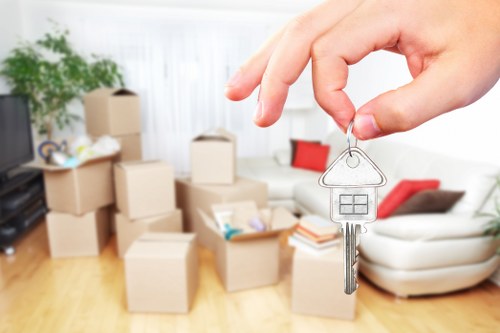 Unpacking boxes and setting up a room after a move in Watford