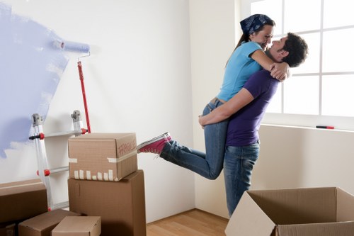 Mover securing furniture safely inside a removal vehicle