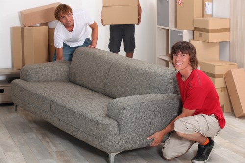 Office relocation setup with packed equipment and labeled boxes