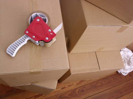 A successful relocation scene showing organized boxes in a new home