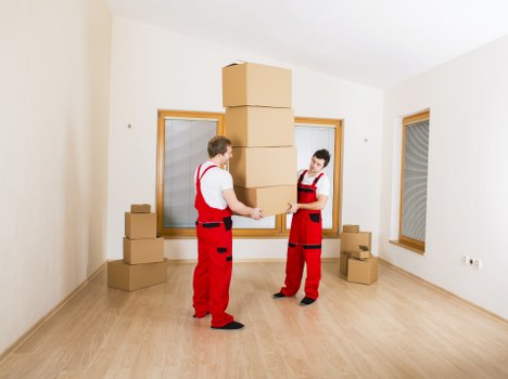 Furniture and household items being moved into a new Watford property